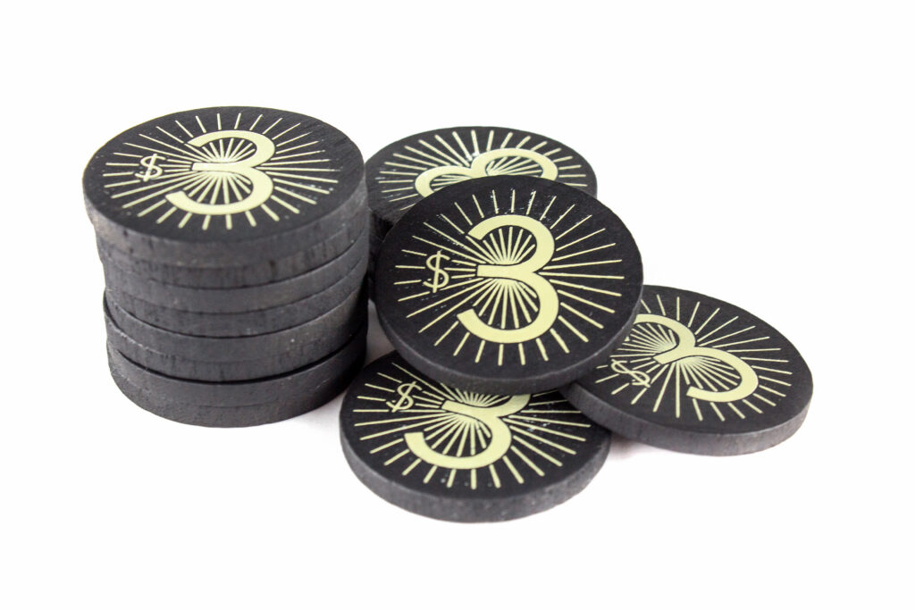 Tokens from Letter Tycoon: Manufactured by Ad Magic